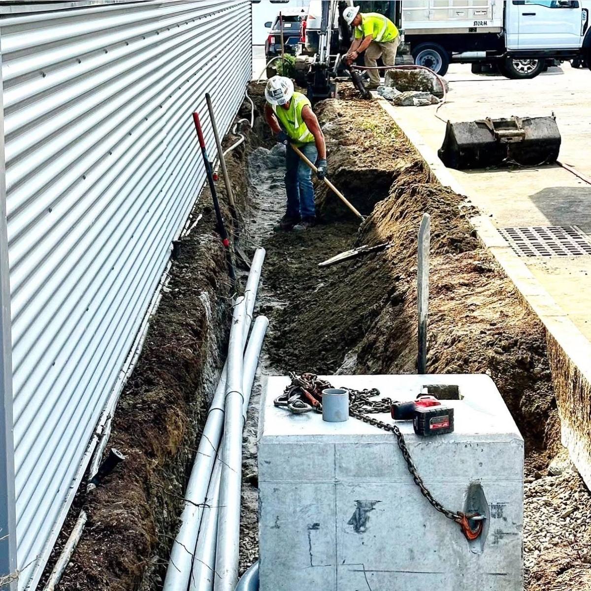 Electrical contractor installing EV charging equipment